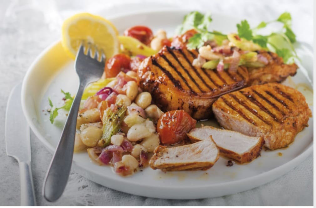 Today’s recipe: Paprika-grilled pork chops with tomato-braised beans
