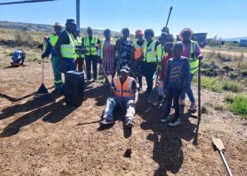 Community unites to reclaim sports field for children